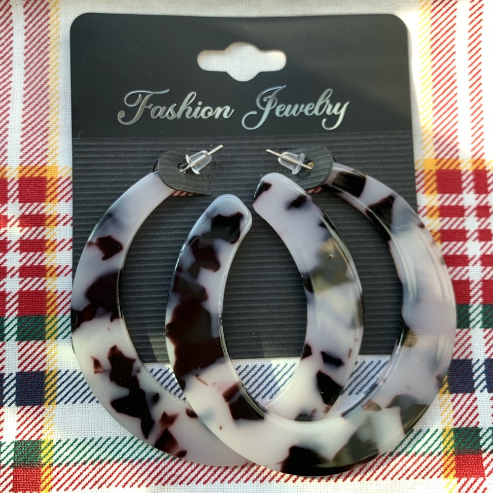 Circle Cow Print Earrings.